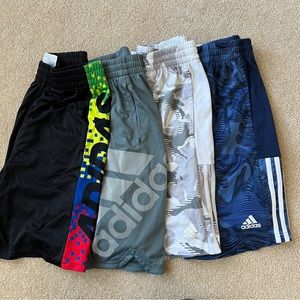 Lot of 4 pairs adidas boys shorts size large (14-16). Perfect condition